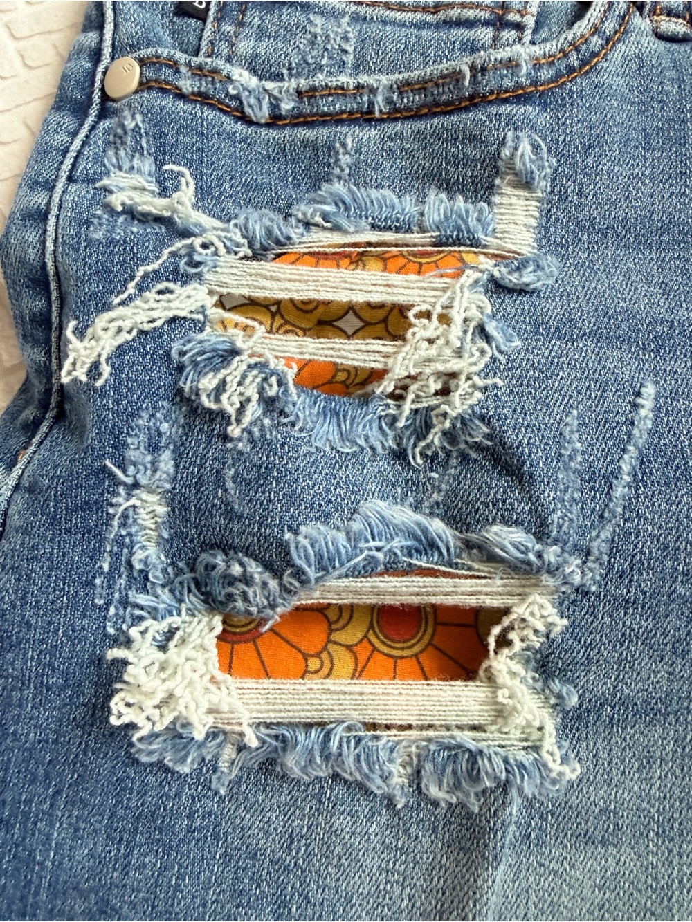 Judy Blue Medium Wash Distressed Denim Shorts with Orange Patch Details - Picture 2 of 3